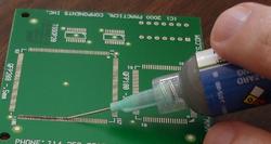 smd soldering،مالیدن خمیر لحیم با استفاده از سورنگ روی مادر برد